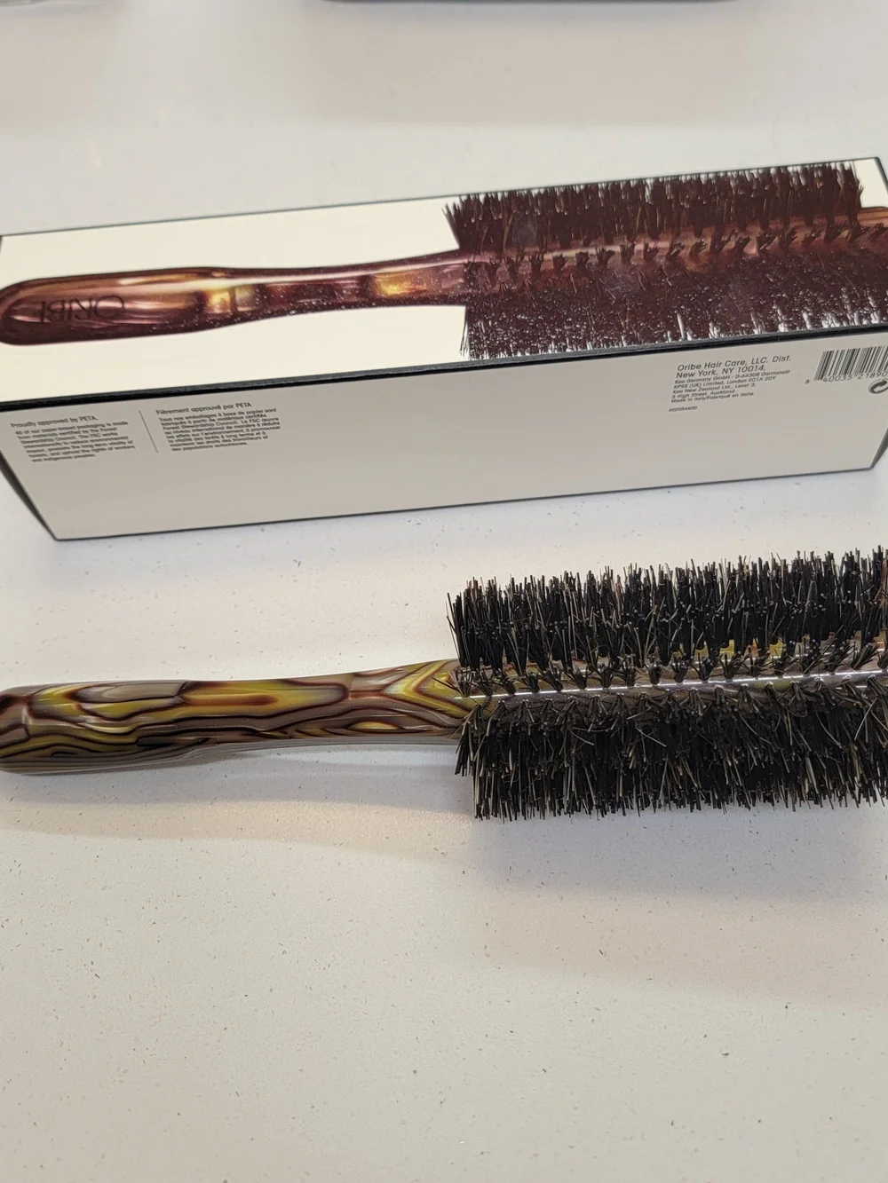 Oribe Round Styling Brush in Brown and Black
